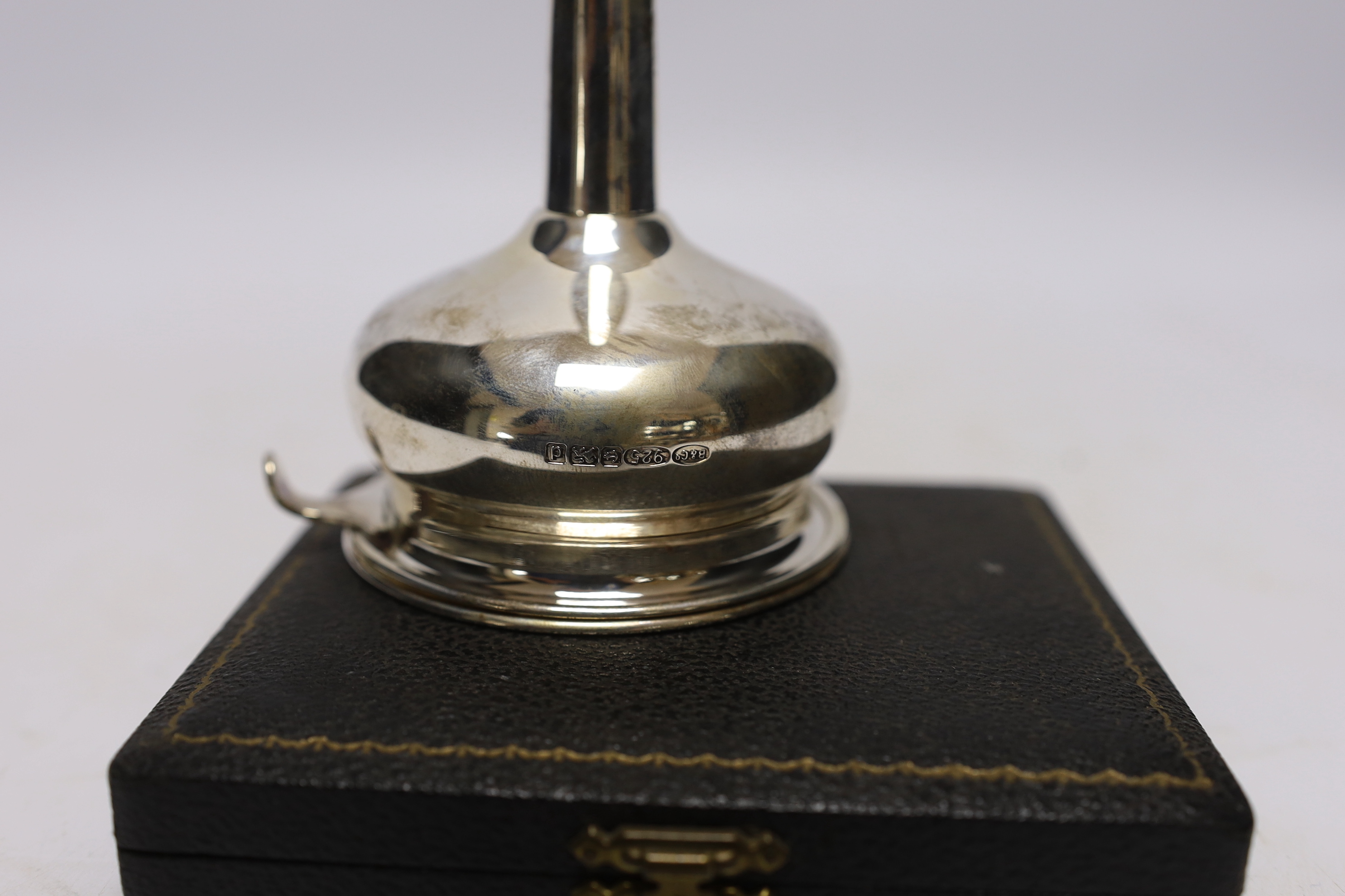 A modern silver wine funnel, Broadway & Co, London, 2003, 13.1cm and a cased set of six earlier silver coffee spoons.